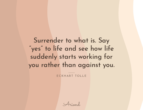 Quote card reading “Surrender to what is. Say “yes” to life and see how life suddenly starts working for you rather than against you.” — Eckhart Tolle, on a autumn floral background